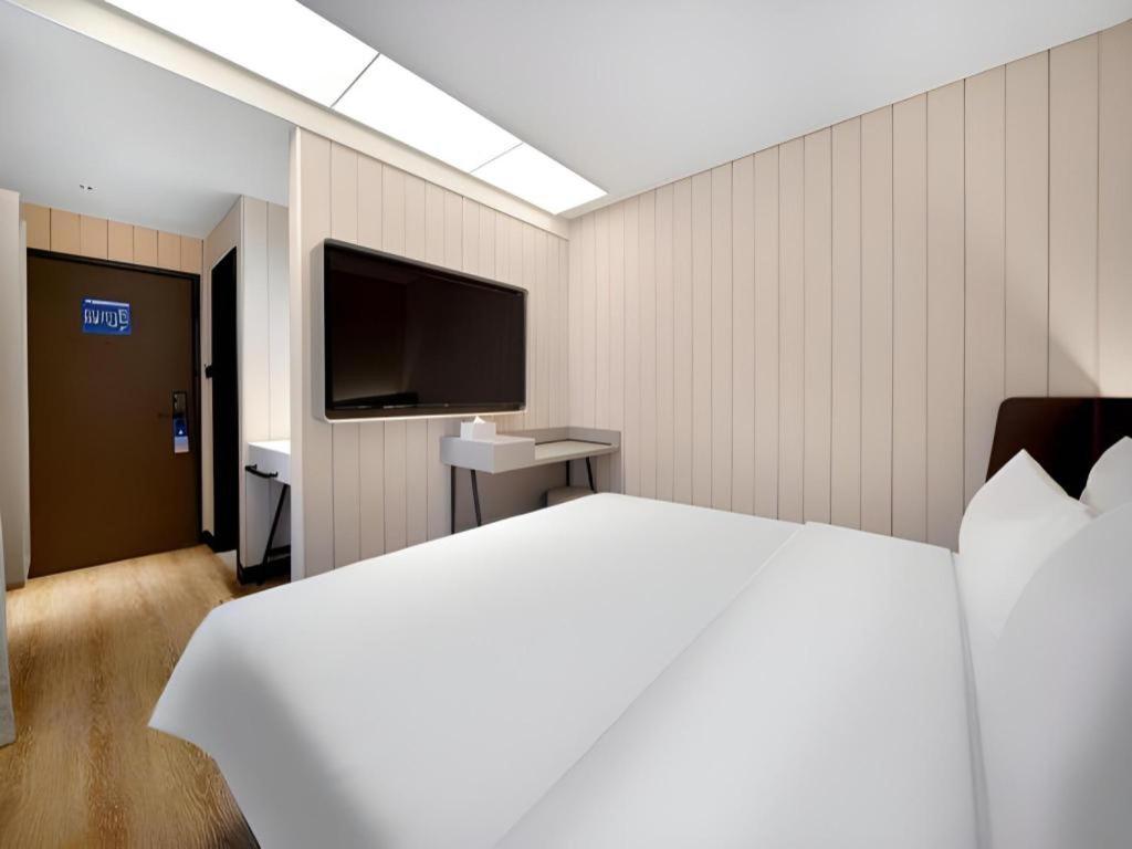 Hanting Hotel Harbin Dongdazhi Street Bagian luar foto
