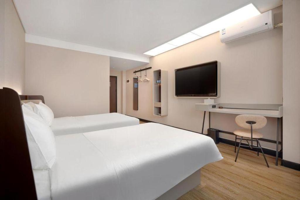 Hanting Hotel Harbin Dongdazhi Street Bagian luar foto