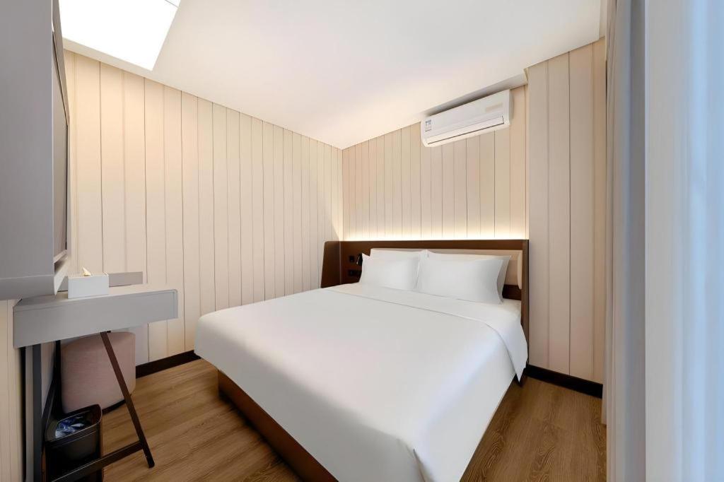 Hanting Hotel Harbin Dongdazhi Street Bagian luar foto