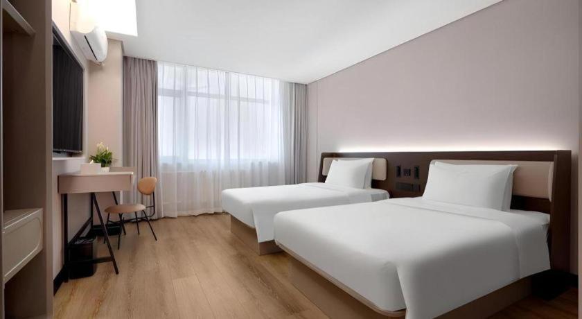 Hanting Hotel Harbin Dongdazhi Street Bagian luar foto