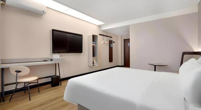 Hanting Hotel Harbin Dongdazhi Street Bagian luar foto
